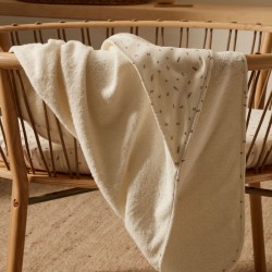 Deya baby towel cape in white cotton with patterns
