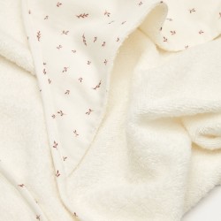 Deya baby towel cape in white cotton with patterns