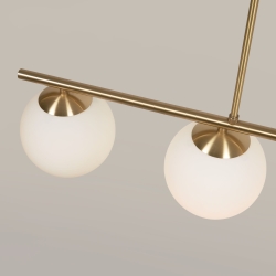 Подвесной светильник Mahala из стали с латунной отделкой и четырьмя сферами из матового стекла